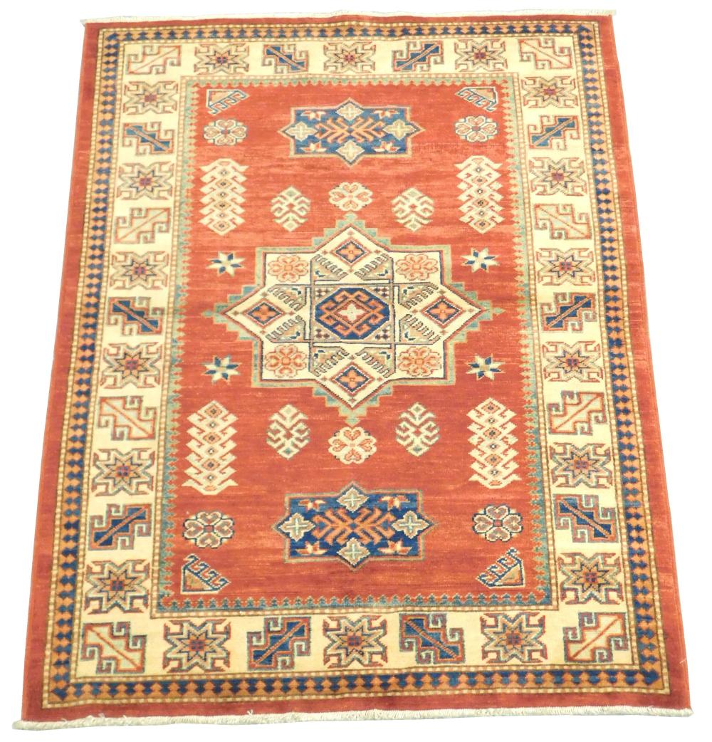 Appraisal: RUG Uzbek Kazak ' x ' soft red field ensconced