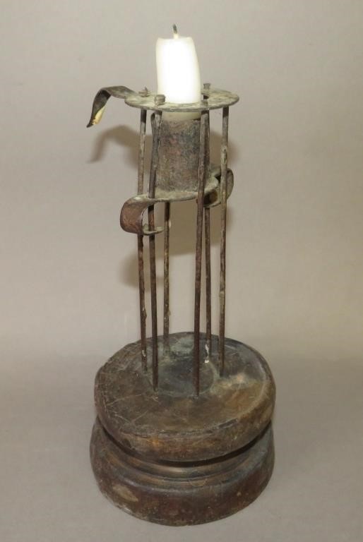 Appraisal: PRIMITIVE SQUIRREL CAGE PUSH-UP CANDLESTICKca th century primitive form with