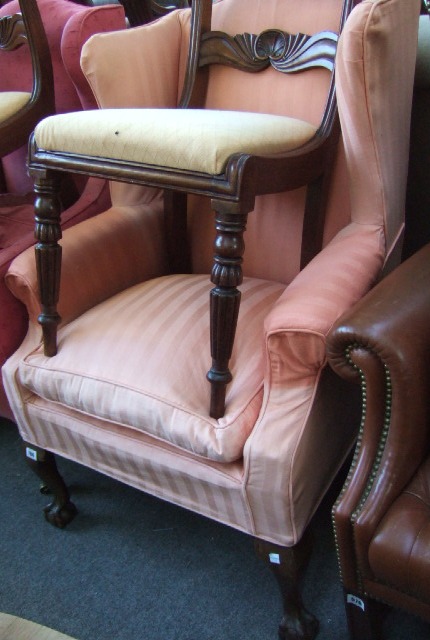 Appraisal: A wing armchair of early th century style on mahogany