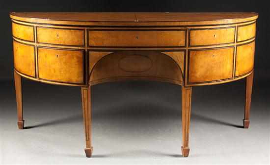 Appraisal: Regency style ebony inlaid satinwood demilune sideboard ebonized highlights on