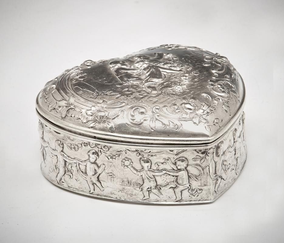 Appraisal: Silver repousse heart shaped box Silver repousse heart shaped box