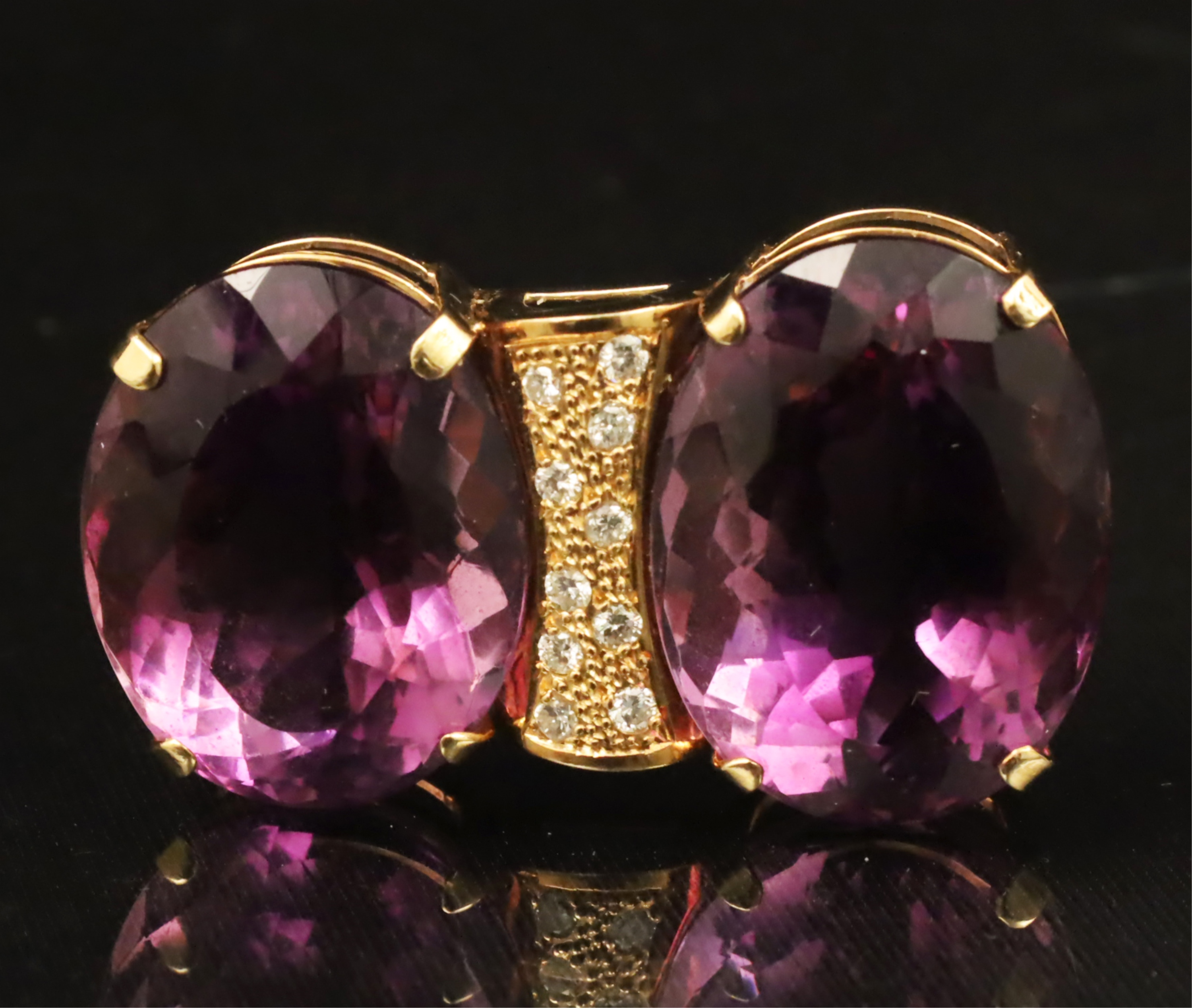 Appraisal: K DIAMOND MOUNTED TWIN OVAL AMETHYST PENDANT K yellow gold