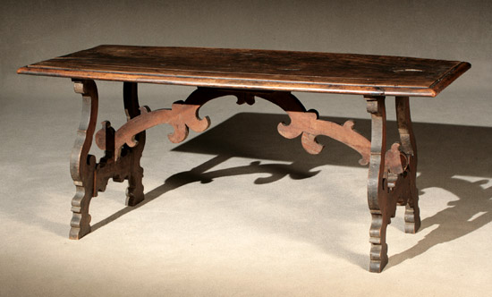 Appraisal: Italian Baroque Walnut Trestle Table Top th Century The base