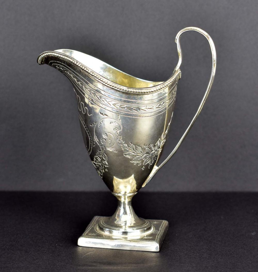 Appraisal: ENGLISH SILVER CREAMERLate th Early th Century Unmarked The helmet