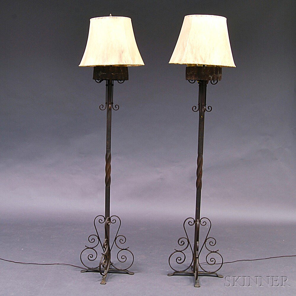 Appraisal: Pair of Wrought Iron Floor Lamps each with six lights