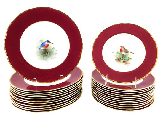 Appraisal: Royal Worcester hand-painted dishes with bird decoration and ruby rim