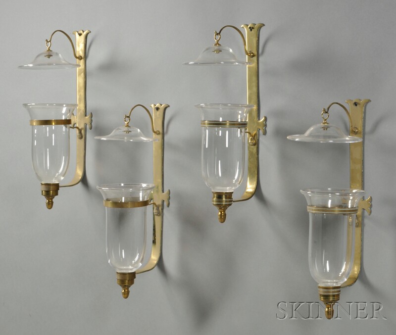 Appraisal: Four Blown Colorless Glass and Brass Single-light Candle Sconces th