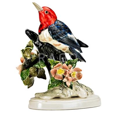 Appraisal: STANGL Glazed porcelain figure of a Red Headed Woodpecker Stamped