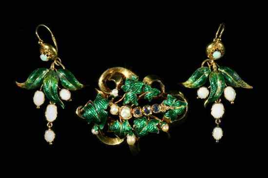 Appraisal: VICTORIAN YELLOW GOLD SAPPHIRE DIAMOND PEARL AND GREEN ENAMEL LEAVES-AND-SCROLLS