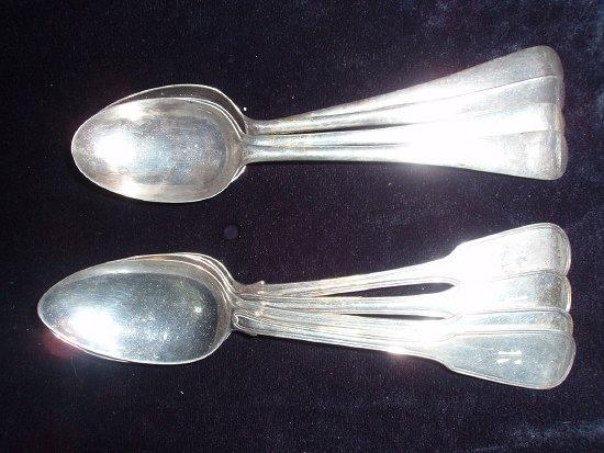 Appraisal: Four matched fiddle and thread pattern table spoons monogrammed R