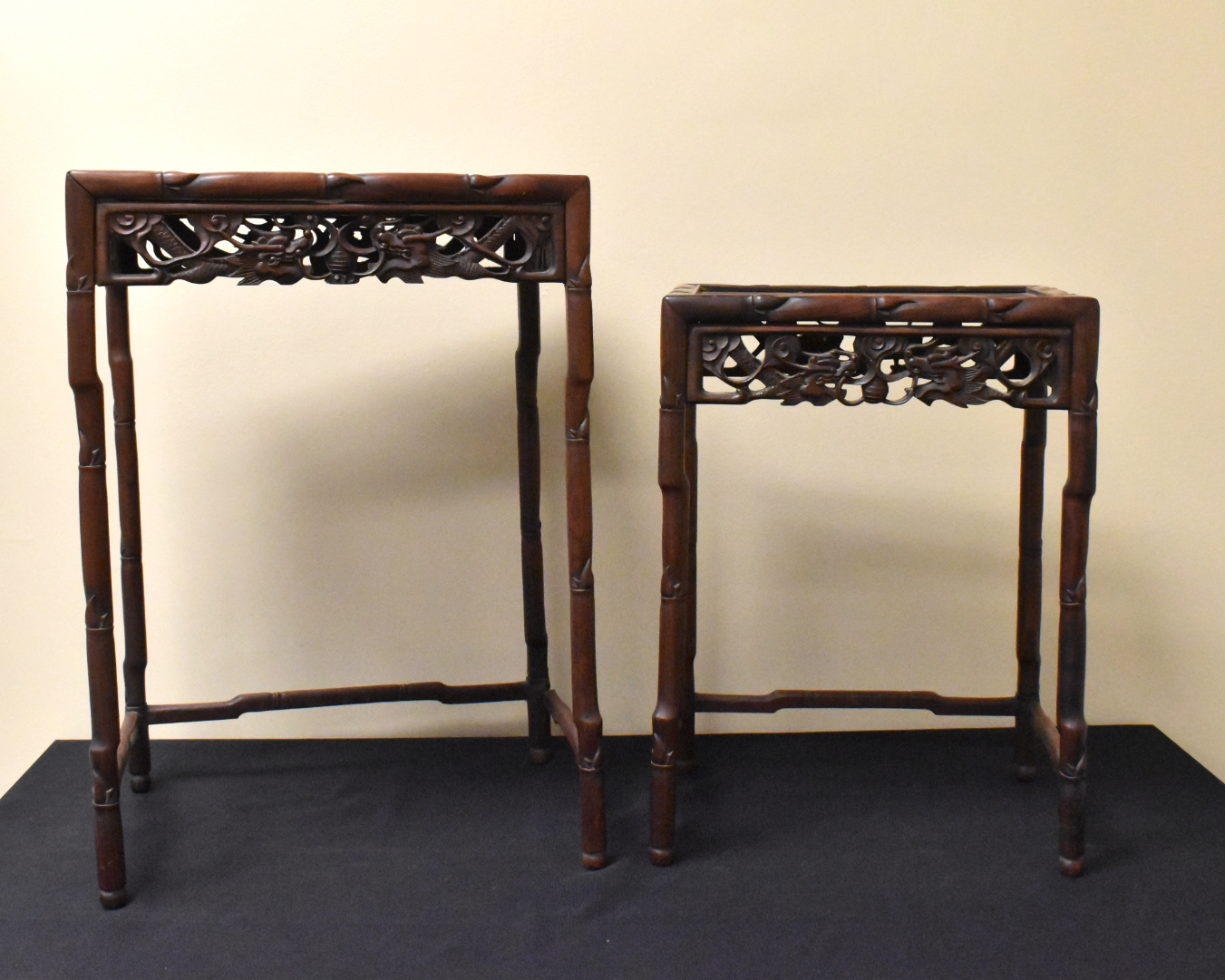 Appraisal: Two Chinese nesting wooden stands dating from the Qing dynasty