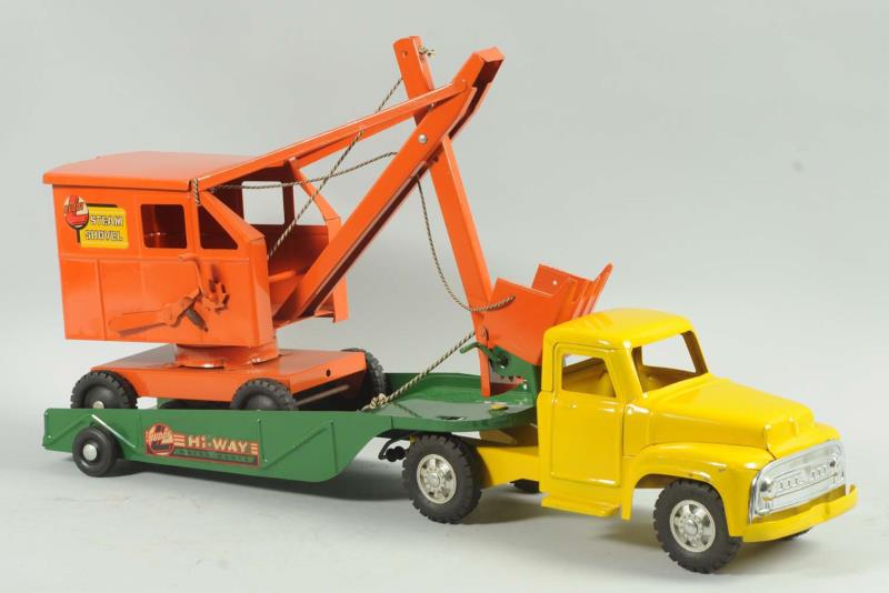 Appraisal: Pressed Steel Buddy L Hauling Rig With construction steam shovel