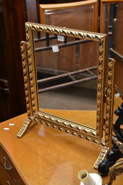 Appraisal: A GILT TOILET MIRROR A GILT TOILET MIRROR