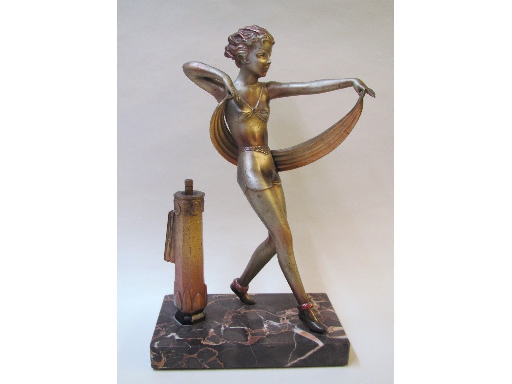 Appraisal: An Art Deco spelter lighter modelled as a female dancer