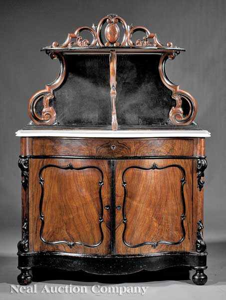 Appraisal: An American Rococo Carved and Ebonized Rosewood Server mid- th