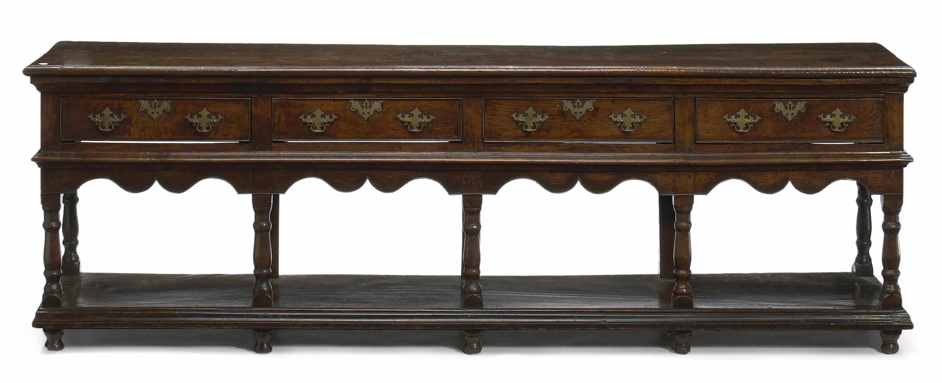 Appraisal: A George III oak low dresser fourth quarter th centuryheight