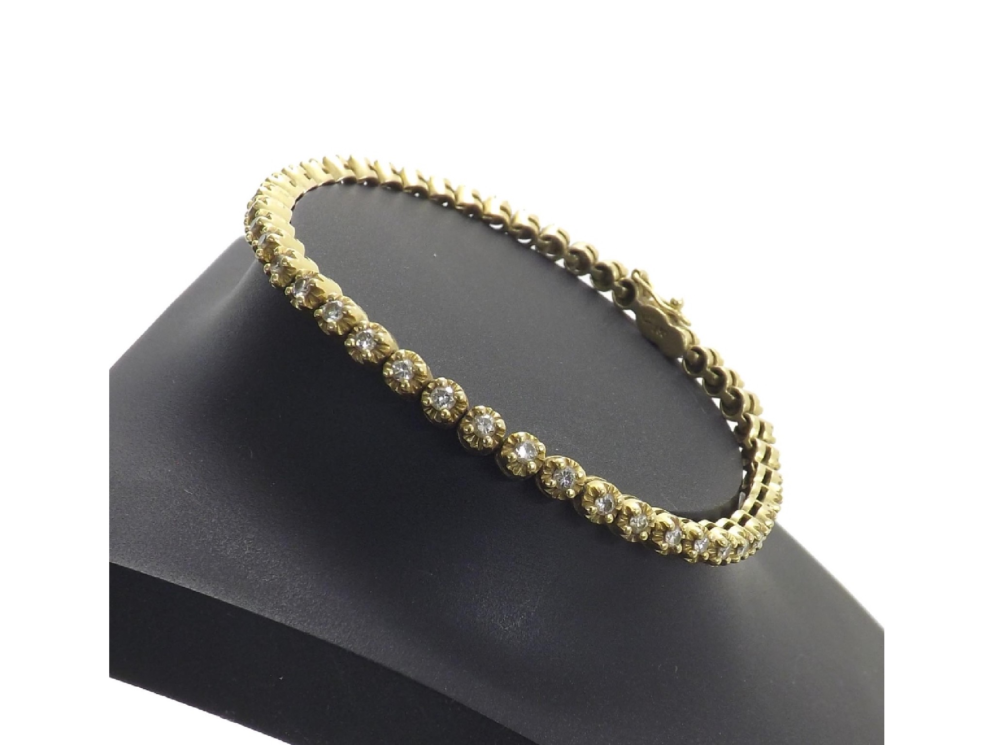 Appraisal: ct yellow gold diamond line bracelet round brilliant-cut diamonds in