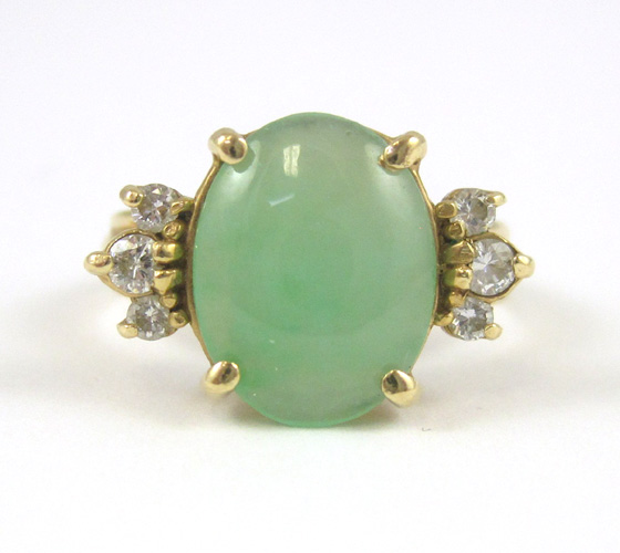 Appraisal: JADE DIAMOND AND FOURTEEN KARAT GOLD RING with three round-cut