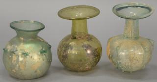 Appraisal: Three Roman Empire small glass flasks or sprinkler flasks rd