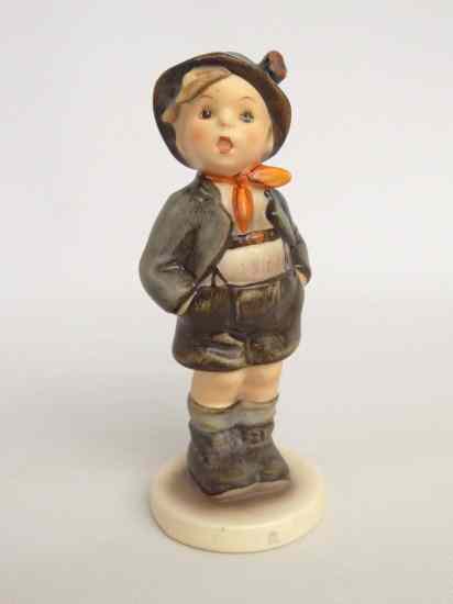 Appraisal: Hummel figurine Swiss boy with hands in pocket full Bee