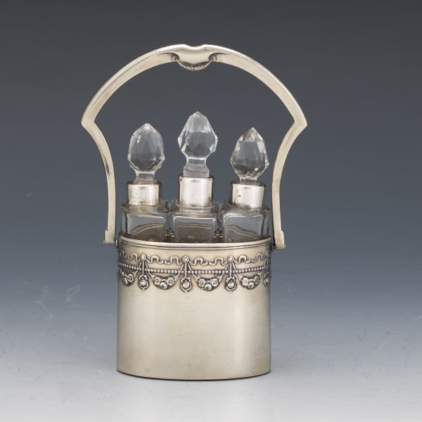 Appraisal: ITALIAN ANTIQUE SILVER AND CRYSTAL THREE-BOTTLE PERFUME VANITY BASKET x