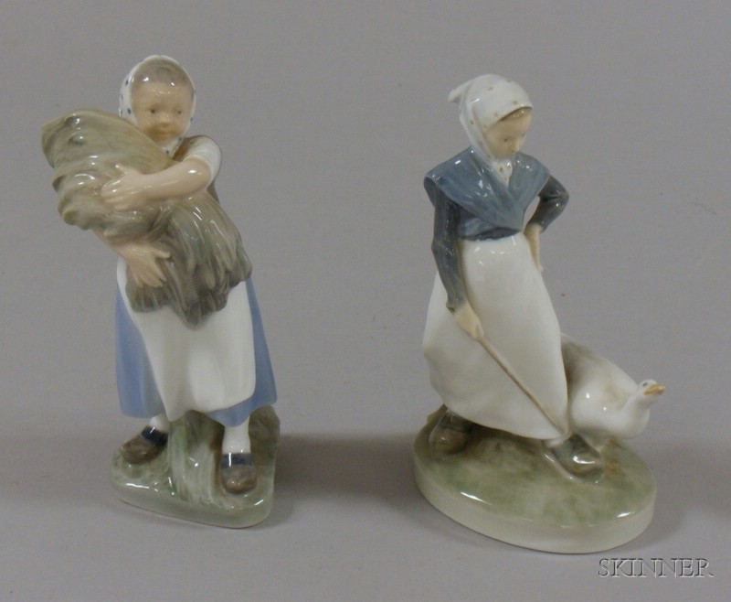 Appraisal: Two Royal Copenhagen Figures rural scene of a girl with