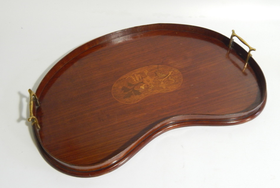 Appraisal: A Sheraton revival mahogany serving tray of kidney shape with