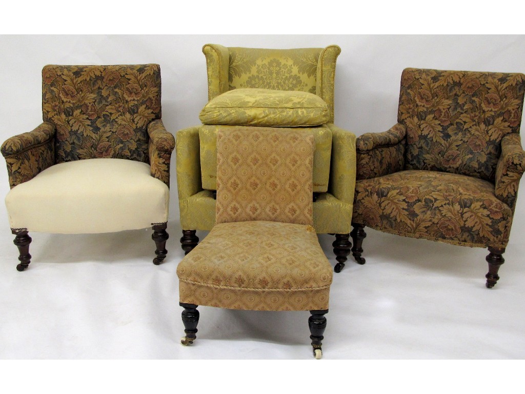 Appraisal: A pair of Victorian armchairs with floral upholstery and raised