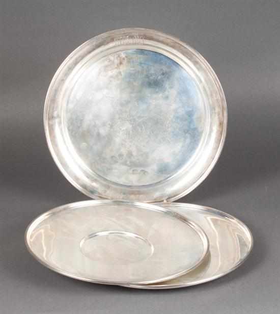 Appraisal: Three American sterling silver round serving trays th century comprising