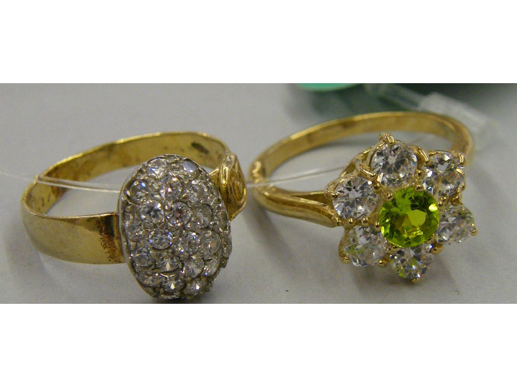 Appraisal: ct peridot and cz cluster ring and an ct cz