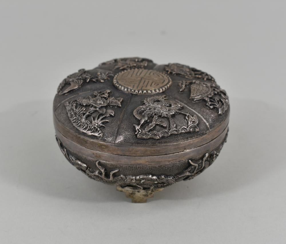 Appraisal: CHINESE EXPORT SILVER COVERED CIRCULAR BOXThe lid chased with mythical