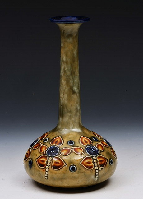 Appraisal: A DOULTON GLAZED BOTTLE VASE with leaf decoration cm high