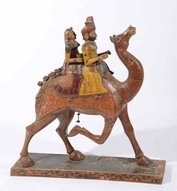 Appraisal: A RAJASTHAN LARGE PAINTED MODEL OF A CAMEL with two