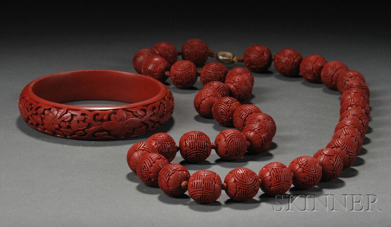 Appraisal: Faux Cinnabar Bangle and Beads China necklace carved with shou