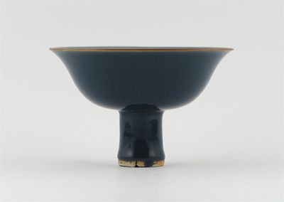 Appraisal: A Chinese late Ming stem bowl with a flared rim