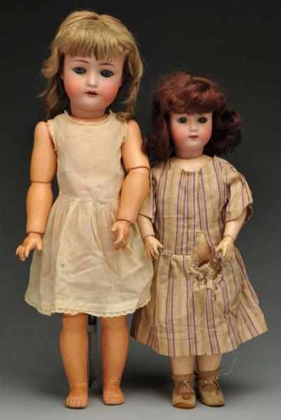 Appraisal: Lot of Child Dolls Description German bisque socket heads sleeping