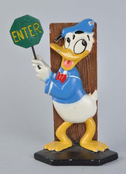 Appraisal: Cast Iron Donald Duck Holding Stop Sign Doorstop Marked Walt