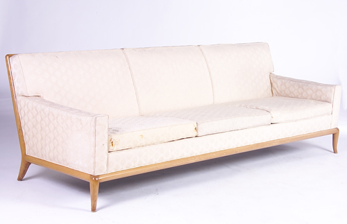 Appraisal: T H ROBSJOHN-GIBBINGS WIDDICOMB Three-seat sofa with patterned fabric upholstery