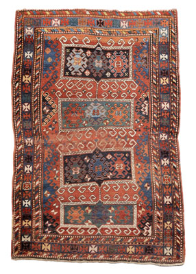 Appraisal: Kazak Rug th century four rectangular central panels on brick-red