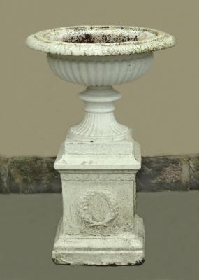 Appraisal: A VICTORIAN CAST IRON URN of lobed shallow circular form