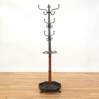 Appraisal: English cast iron brass and mahogany hall tree English cast