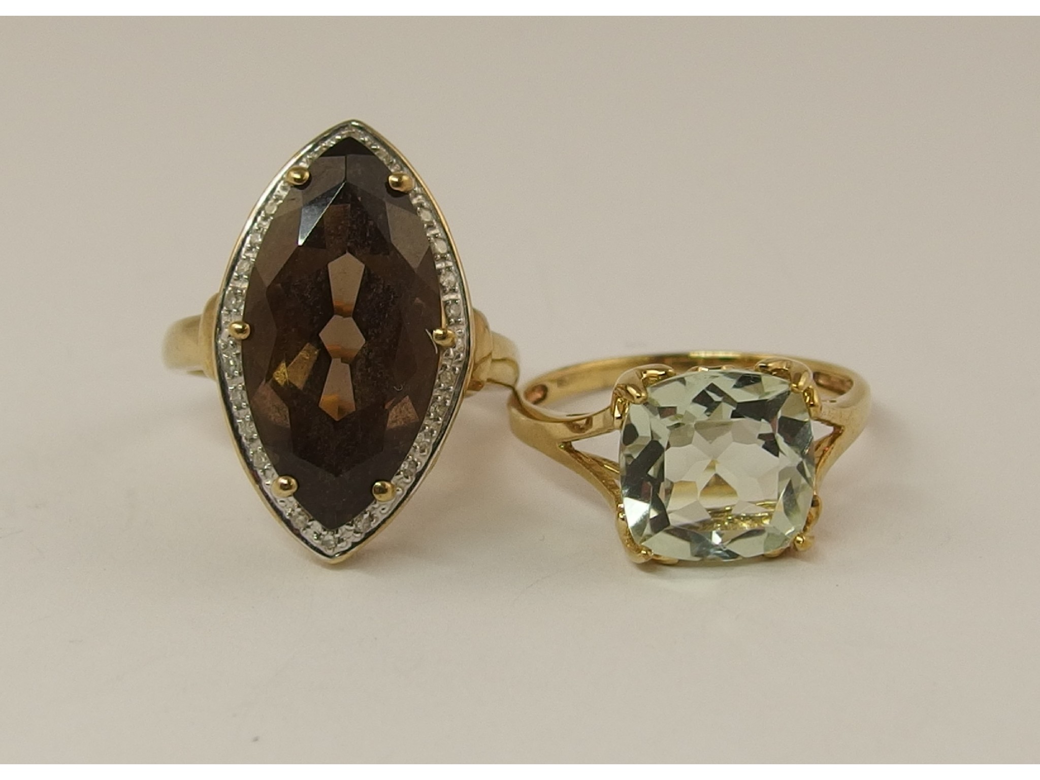 Appraisal: A ct diamond and smoky quartz ring and a ct