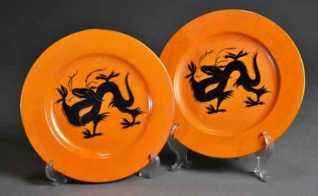 Appraisal: TWO RARE CZECH DRAGON PLATESTwo orange plates with black dragon