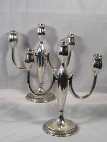 Appraisal: A pair of German silver three branch candelabra hallmarked Germany