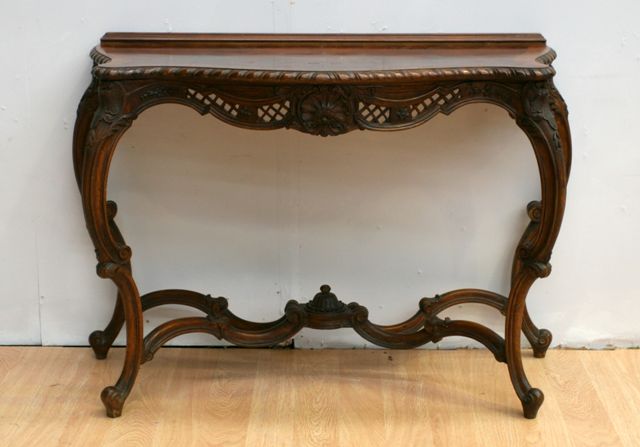 Appraisal: A Louis XV style walnut console table with burr walnut