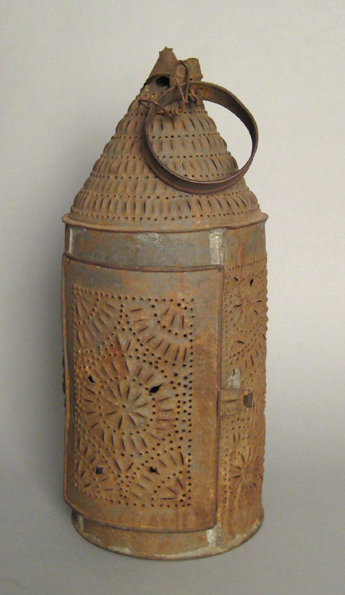 Appraisal: Massive punched tin hanging lantern th c h