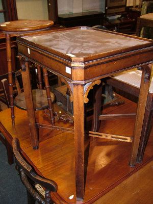 Appraisal: A Reproduction mahogany side table the rectangular galleried top upon