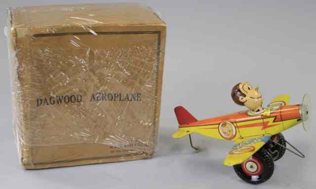 Appraisal: BOXED DAGWOOD AEROPLANE Louis Marx c colorful tin lithography depicts