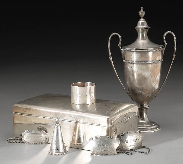 Appraisal: An English silver group Comprising urn with cover after the