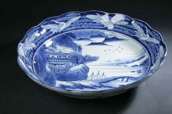 Appraisal: TWO JAPANESE BLUE AND WHITE PORCELAIN SCALLOPED SHALLOW BOWLS Meiji